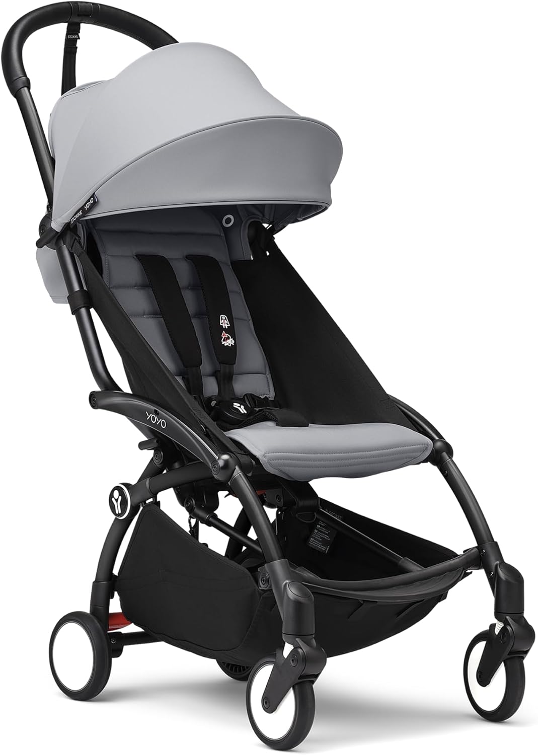 Cochecito compacto para bebé - Chasis negro y asiento color Stone - Arnés de 5 puntos y estructura ligera - Plegado rápido compatible con equipaje de mano